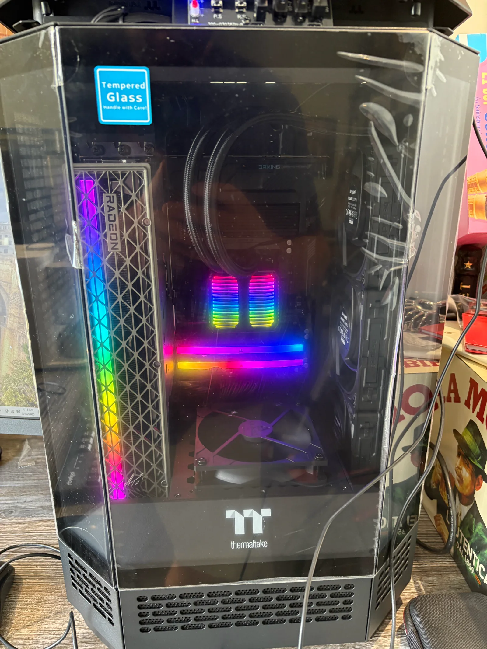 Open desktop PC case with the side panel off, showing the parts inside