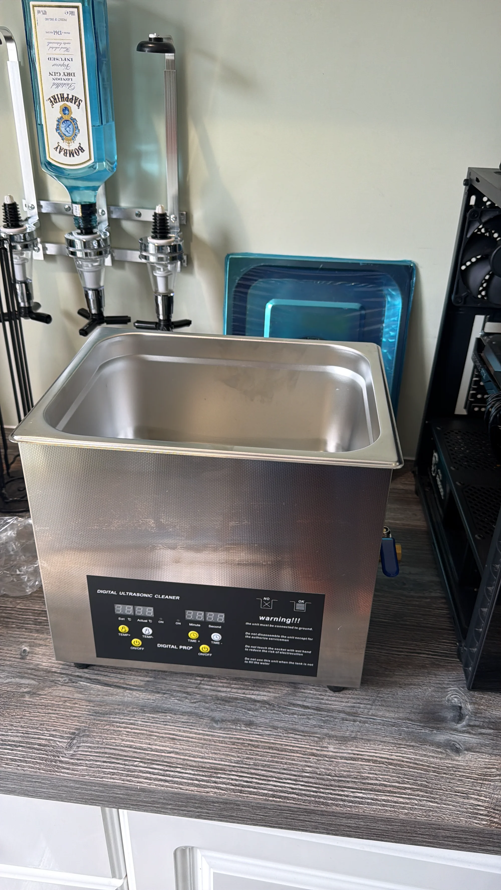 Ultrasonic cleaning tank for liquid damage recovery — LaunchLayer (Basildon)